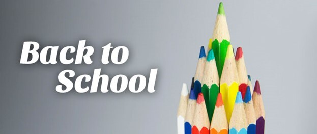 Back to school banner with stack of colored pencils.